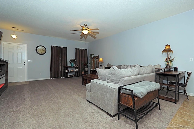 living room featuring ceiling fan