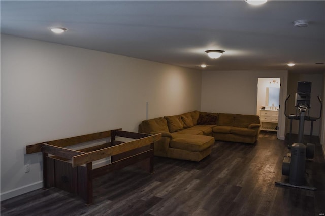 living room with dark hardwood / wood-style flooring