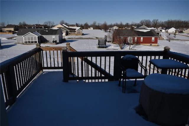 view of snow covered deck