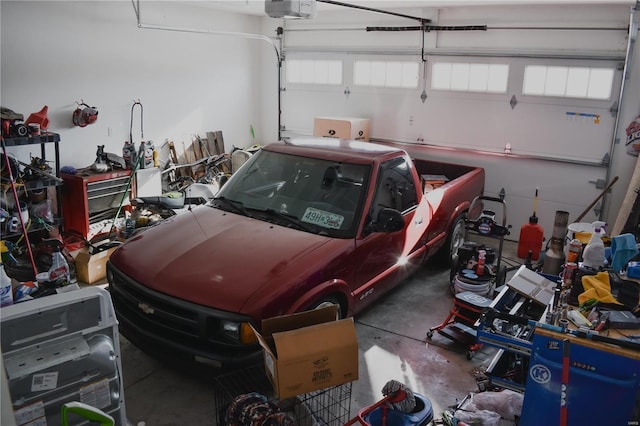 garage featuring a garage door opener