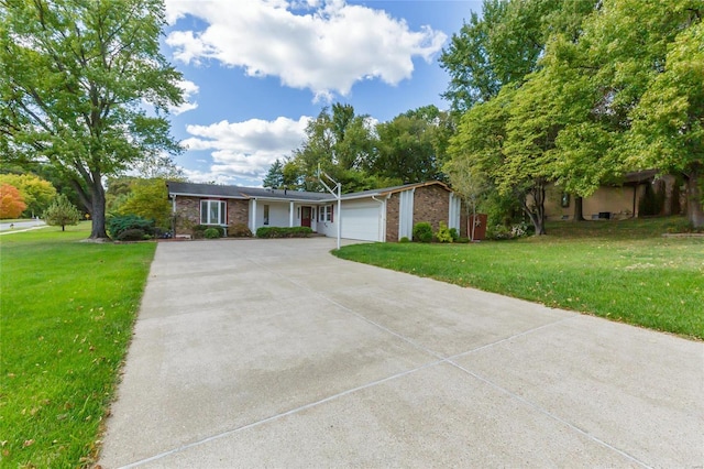 ranch-style home with a front yard and a garage