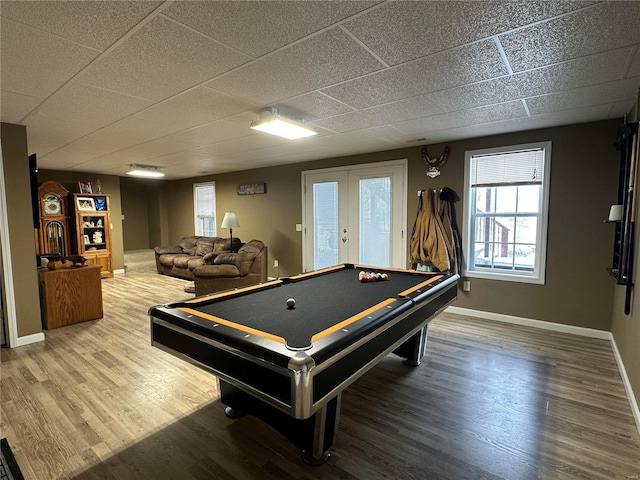 game room with hardwood / wood-style floors, pool table, and french doors