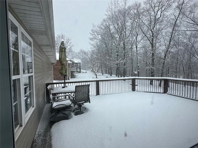 view of snow covered deck