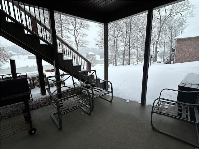 view of snow covered patio