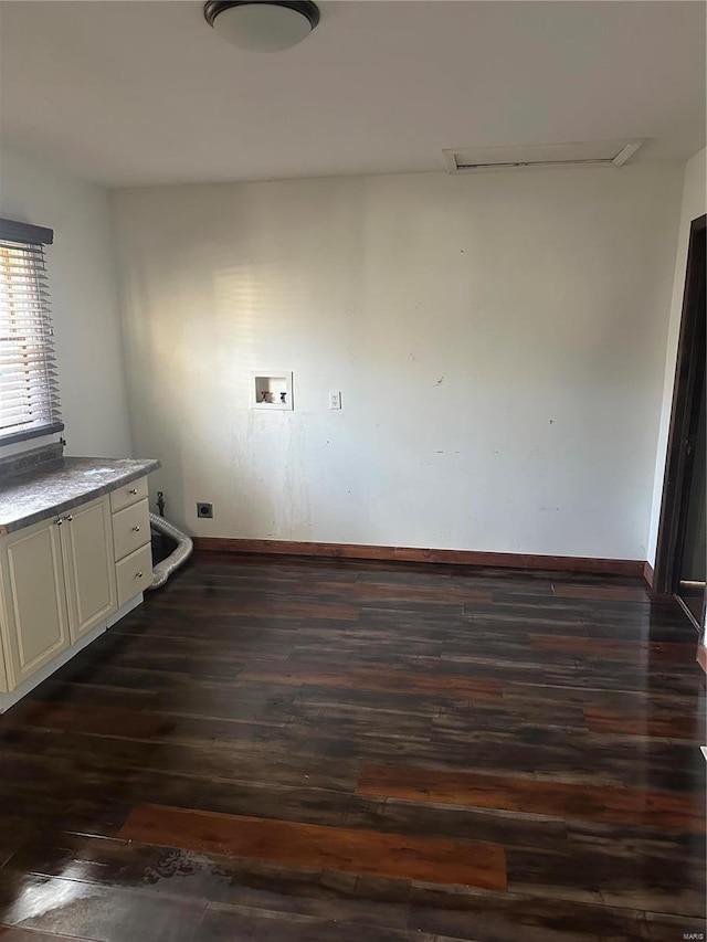 laundry area with dark wood-style floors, hookup for an electric dryer, baseboards, and washer hookup