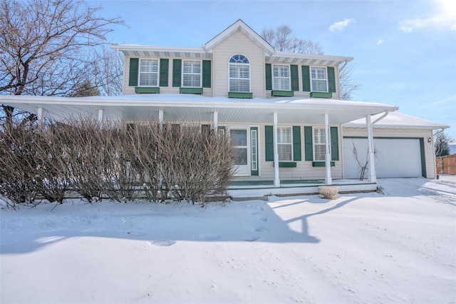 view of front facade with a porch and a garage