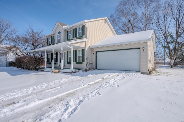 view of front of home featuring covered porch and a garage