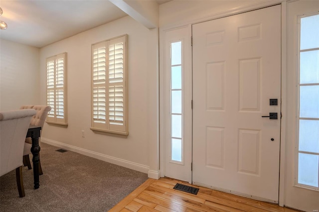 foyer entrance featuring light hardwood / wood-style flooring