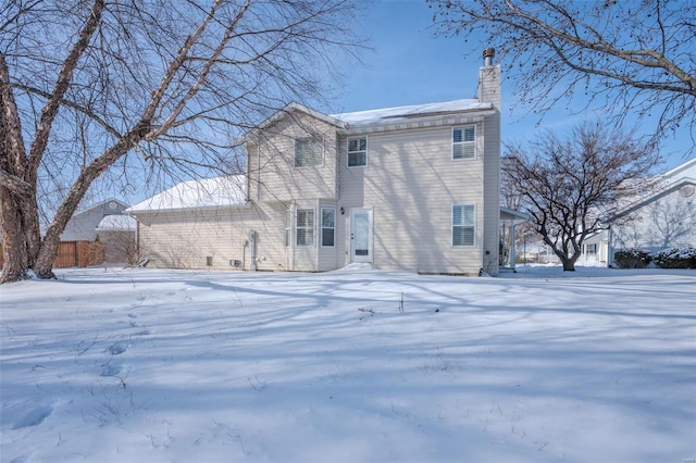 view of snow covered property