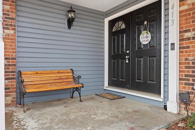 property entrance with a porch