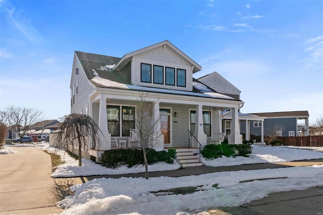 view of front of home featuring covered porch