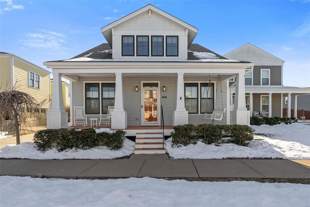 bungalow-style home with covered porch