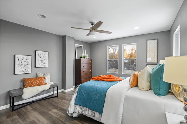 bedroom featuring ceiling fan and dark hardwood / wood-style floors