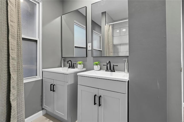 bathroom featuring vanity and a shower with curtain