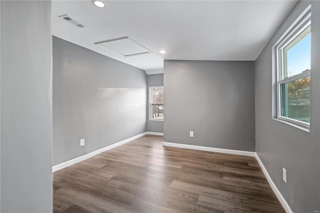 empty room featuring hardwood / wood-style flooring