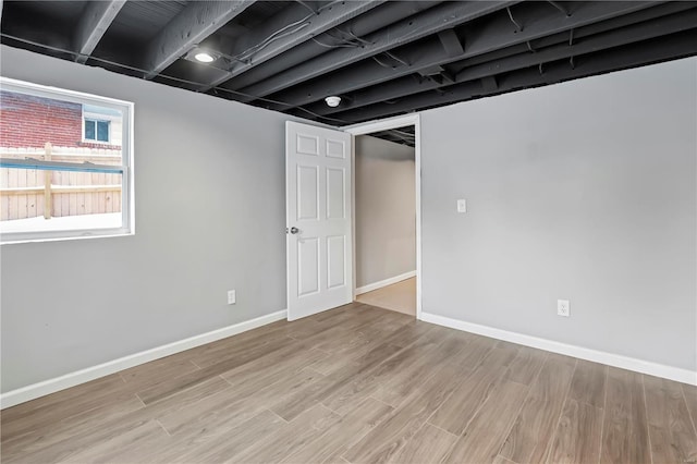 basement with light wood-type flooring