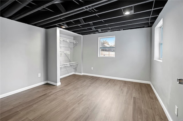 basement with wood-type flooring