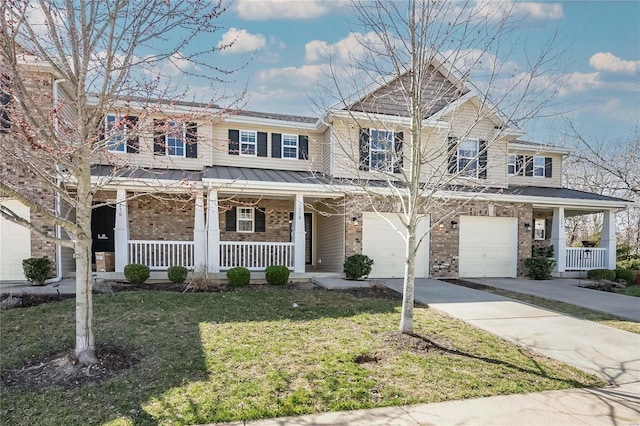 view of front of house featuring brick siding, concrete driveway, a front yard, covered porch, and an attached garage