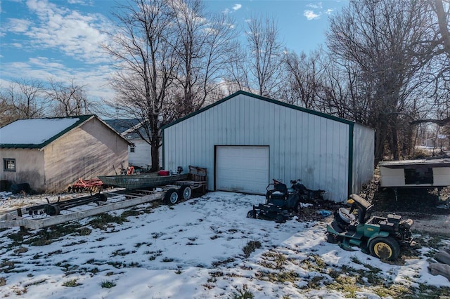 view of snow covered garage