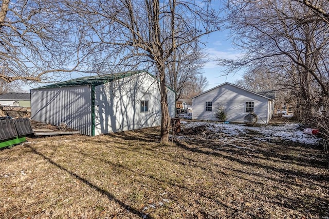 rear view of property with a lawn