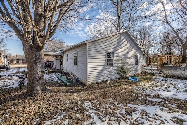 view of snow covered property