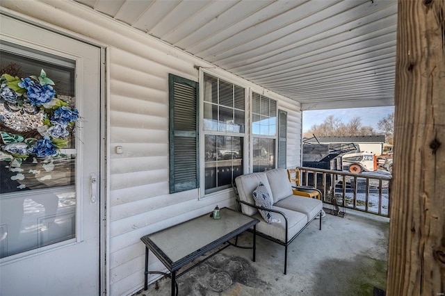 view of patio featuring a porch