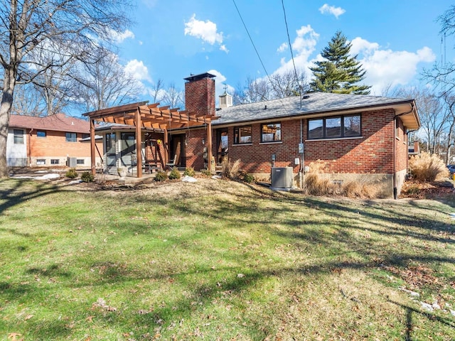 rear view of house featuring a pergola, a lawn, and central air condition unit