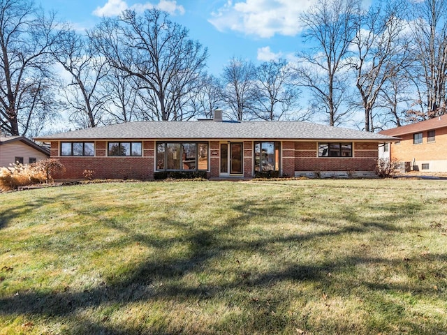 ranch-style house with a front yard