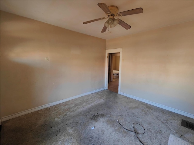 empty room featuring ceiling fan