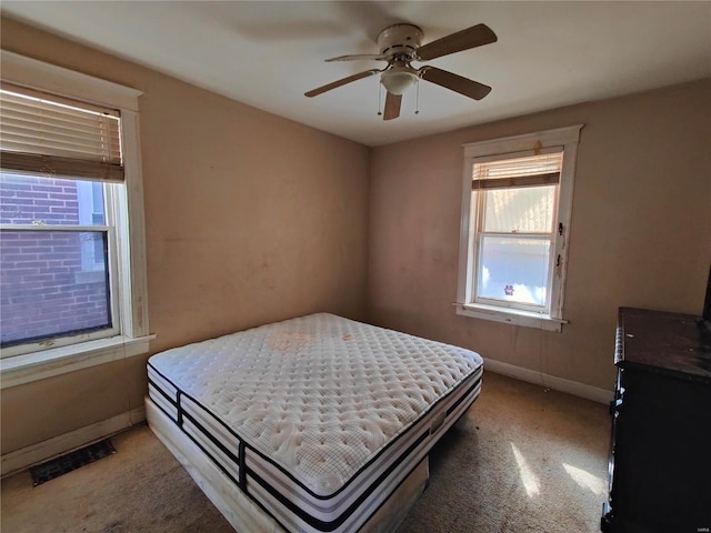 bedroom featuring ceiling fan