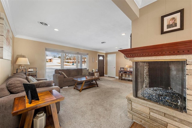 living room with carpet flooring, crown molding, and a stone fireplace