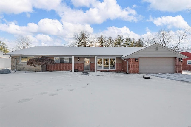 ranch-style home featuring a garage