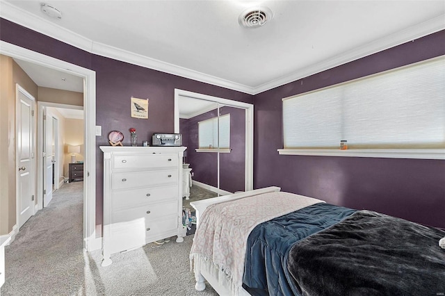 bedroom featuring carpet floors and crown molding