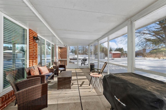 sunroom / solarium featuring a wealth of natural light