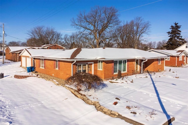 view of snow covered property