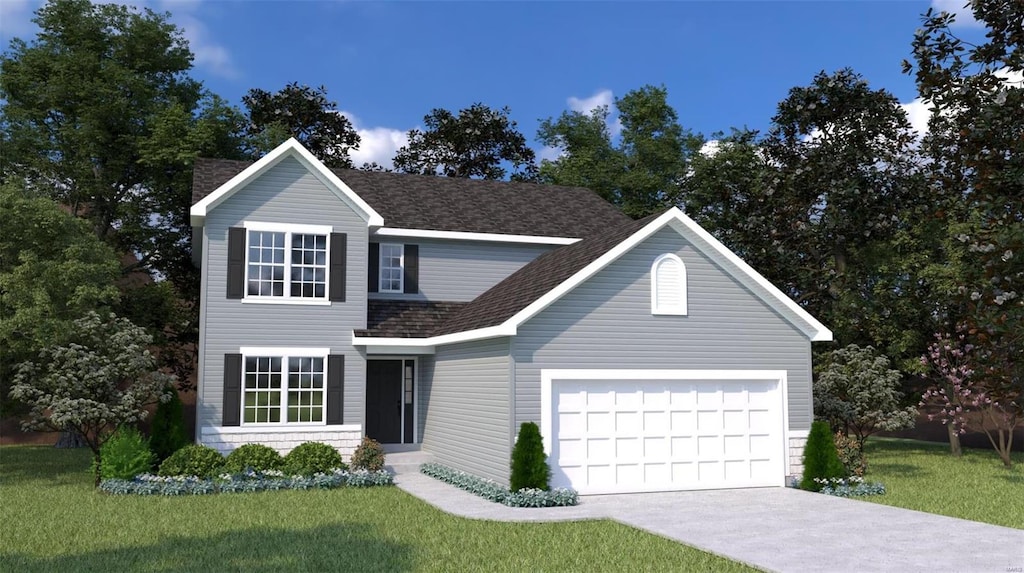 view of property featuring a garage and a front yard