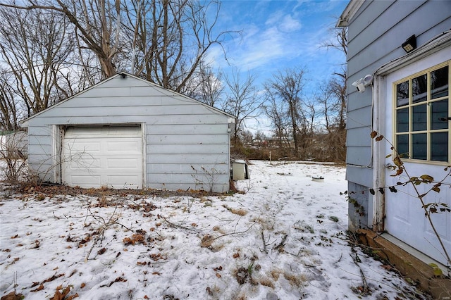 view of snow covered garage