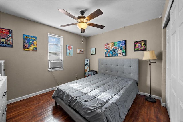 bedroom with ceiling fan, cooling unit, dark hardwood / wood-style flooring, and a closet