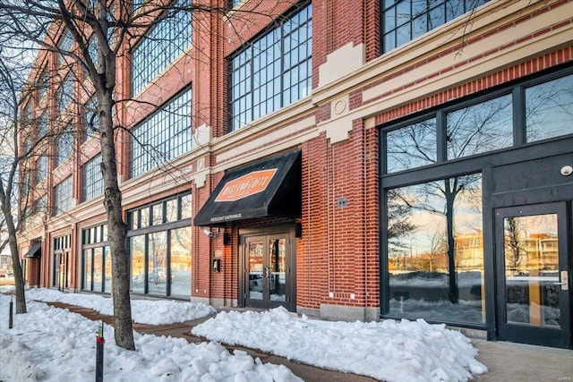 view of snow covered building