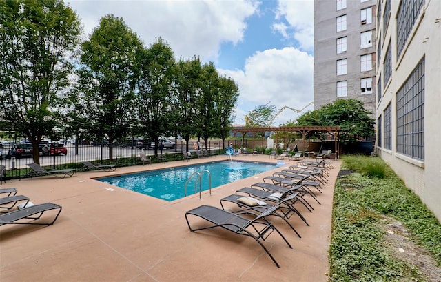 view of pool featuring a pergola and a patio area