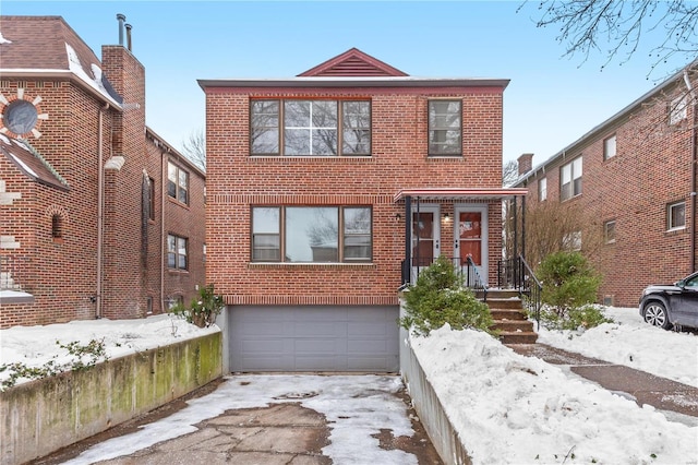 front of property with a garage