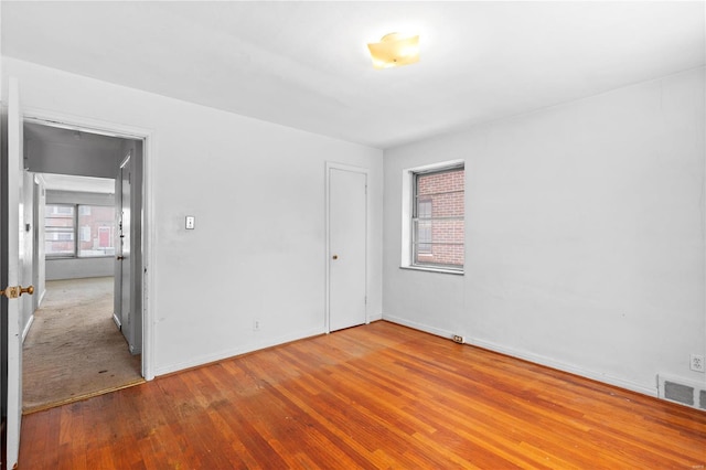 empty room featuring light hardwood / wood-style floors