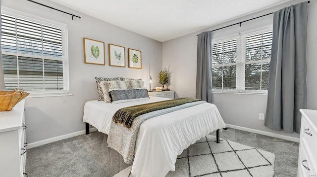 bedroom with light carpet