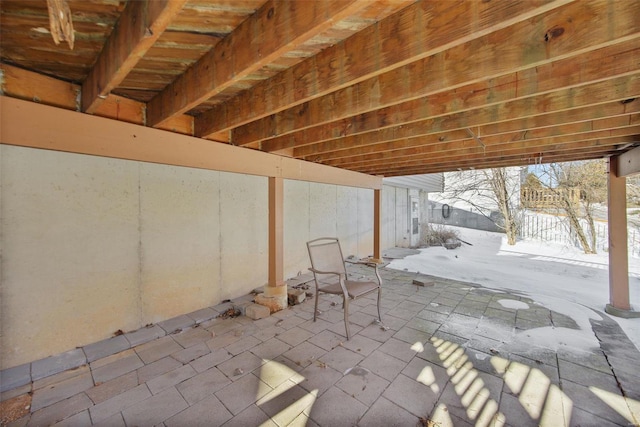 view of snow covered patio