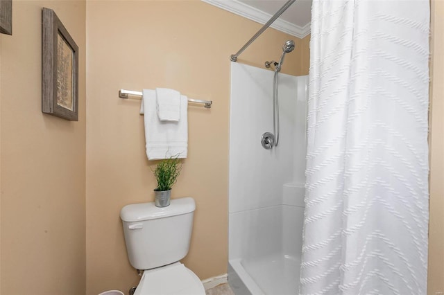 bathroom with walk in shower, ornamental molding, and toilet