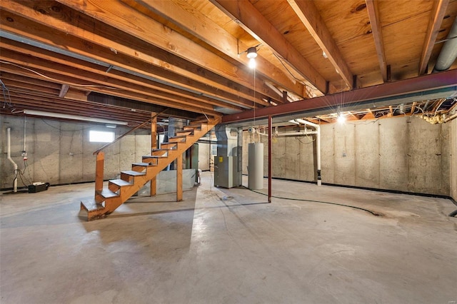 basement featuring water heater and heating unit