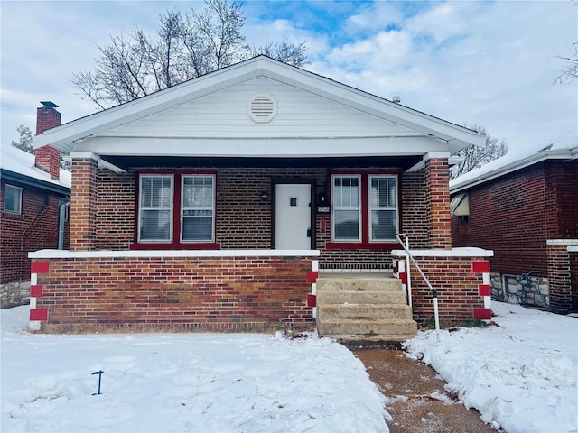 bungalow-style home with covered porch