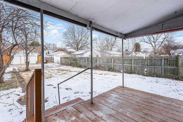 view of snow covered deck