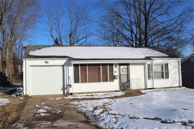 ranch-style home with a garage