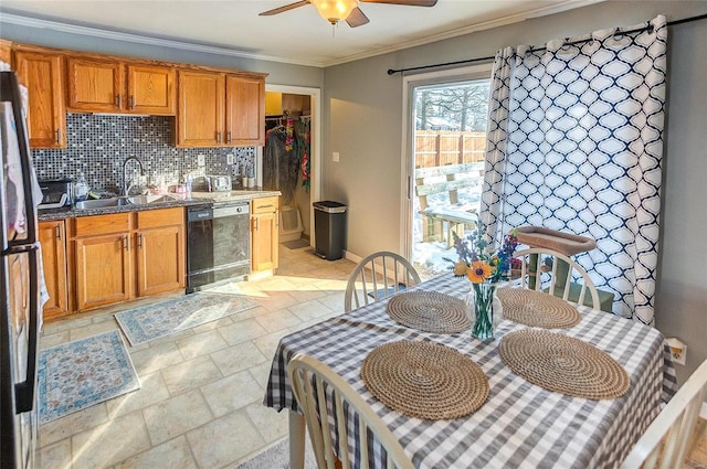 kitchen featuring dishwasher, sink, backsplash, refrigerator, and ornamental molding